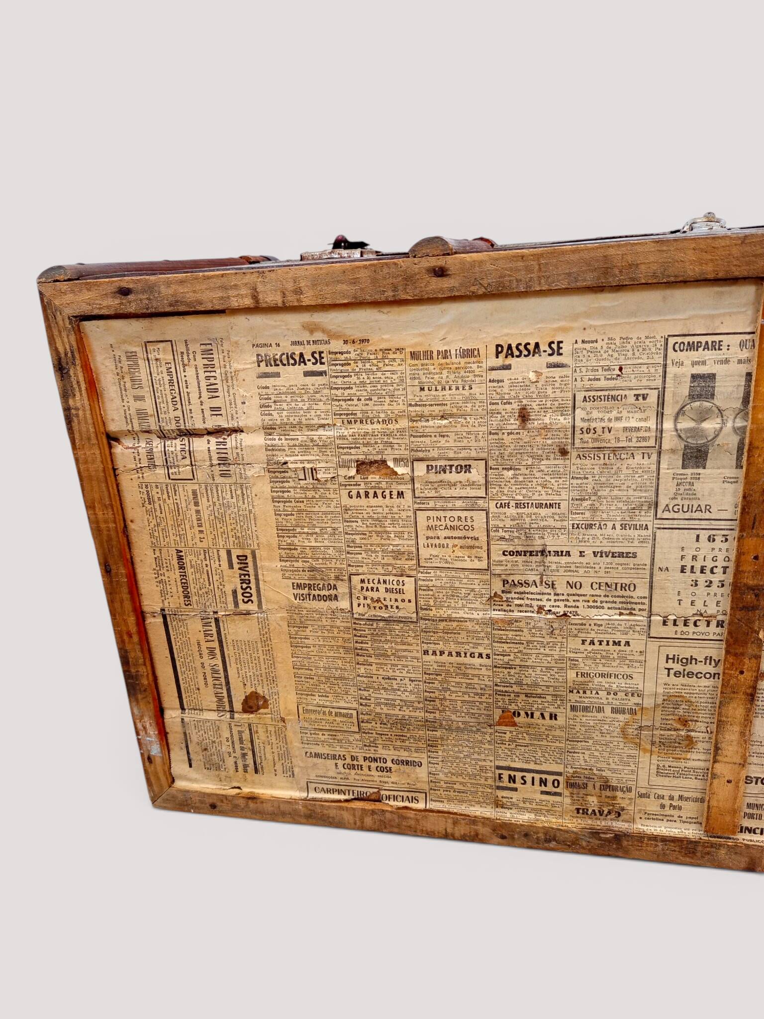 Vintage wooden and metal green travel trunk, circa 1930.