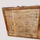 Vintage wooden and metal green travel trunk, circa 1930.