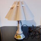 Ceramic table lamp with fish and plant decor and its lampshade