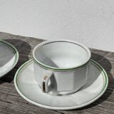 Pair of vintage Apilco style bistro cups in white and green ceramic