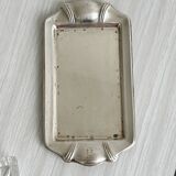 Metal butter dish and thick rectangular glass bowl.