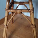 Round coffee table in wicker and bamboo
