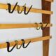 Rare coat rack by Carl Auböck with hat rack, cabinet, brass, walnut and beech, 1950s.