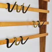 Rare coat rack by Carl Auböck with hat rack, cabinet, brass, walnut and beech, 1950s.