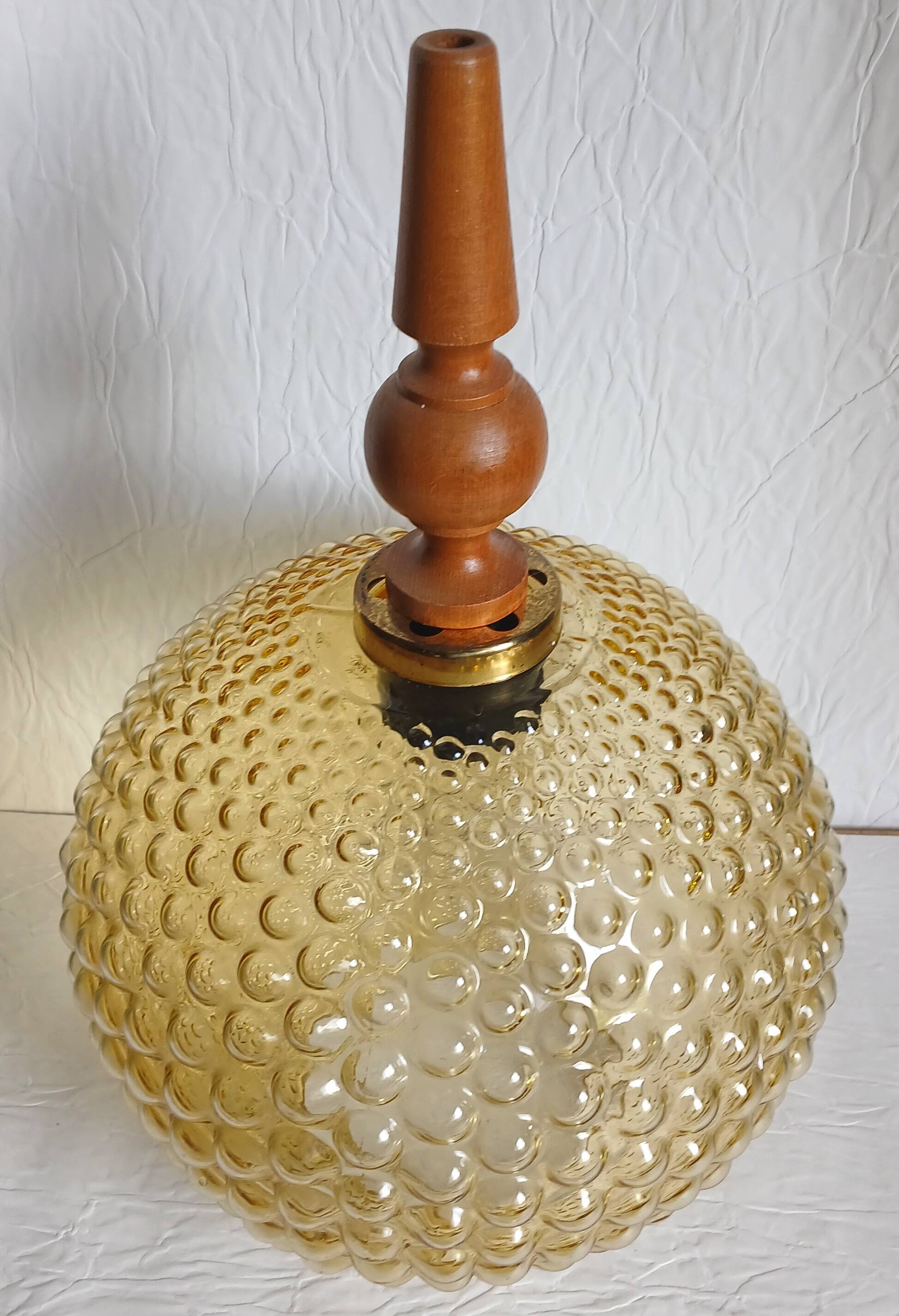 "Bubble" suspension in the style of H. Tynell in amber moulded glass, circa 1970.