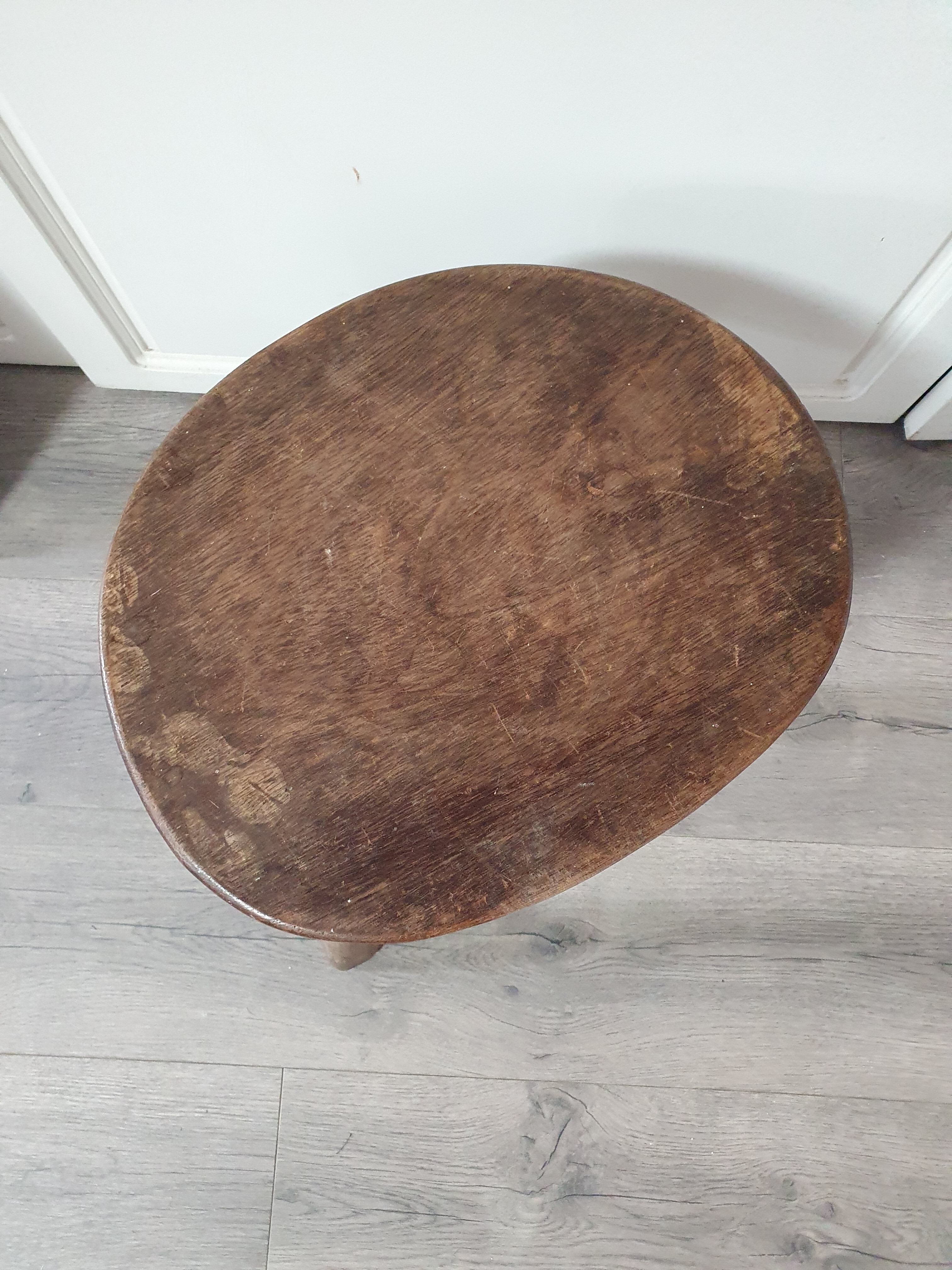 Vintage old wooden stool tripod