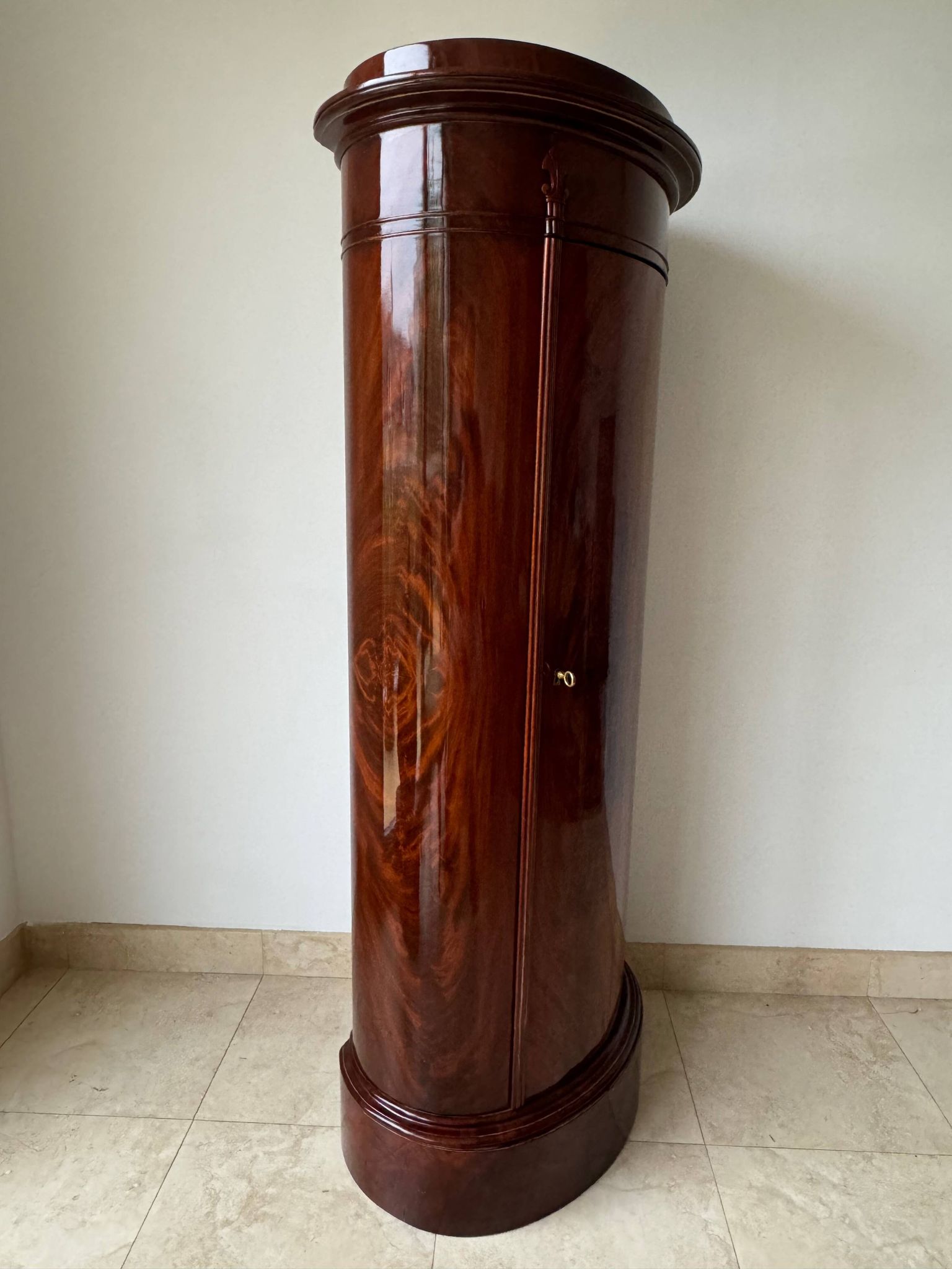 Somno “Column” or Cylindrical Cabinet, in flamed mahogany, Copenhagen, 1830-1840