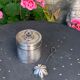 Sprinkling spoon and art deco sugar pot in silver metal