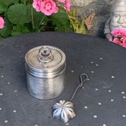 Sprinkling spoon and art deco sugar pot in silver metal