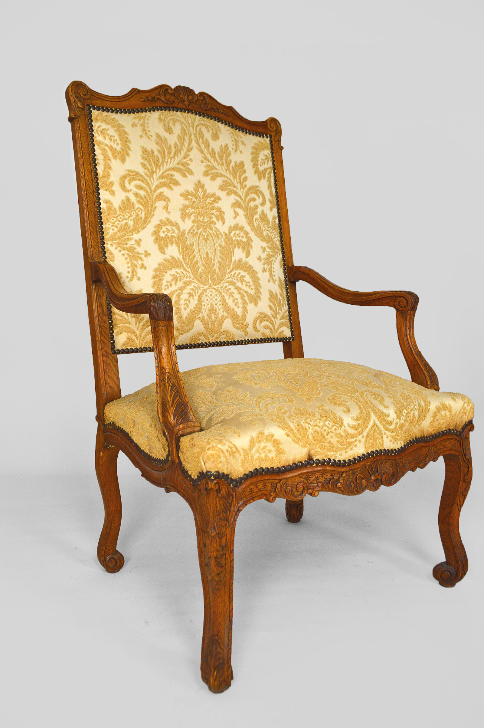 Set of 2 armchairs in carved oak, Louis XV style