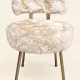 Vintage 1960s dressing table chair with faux fur and golden legs.