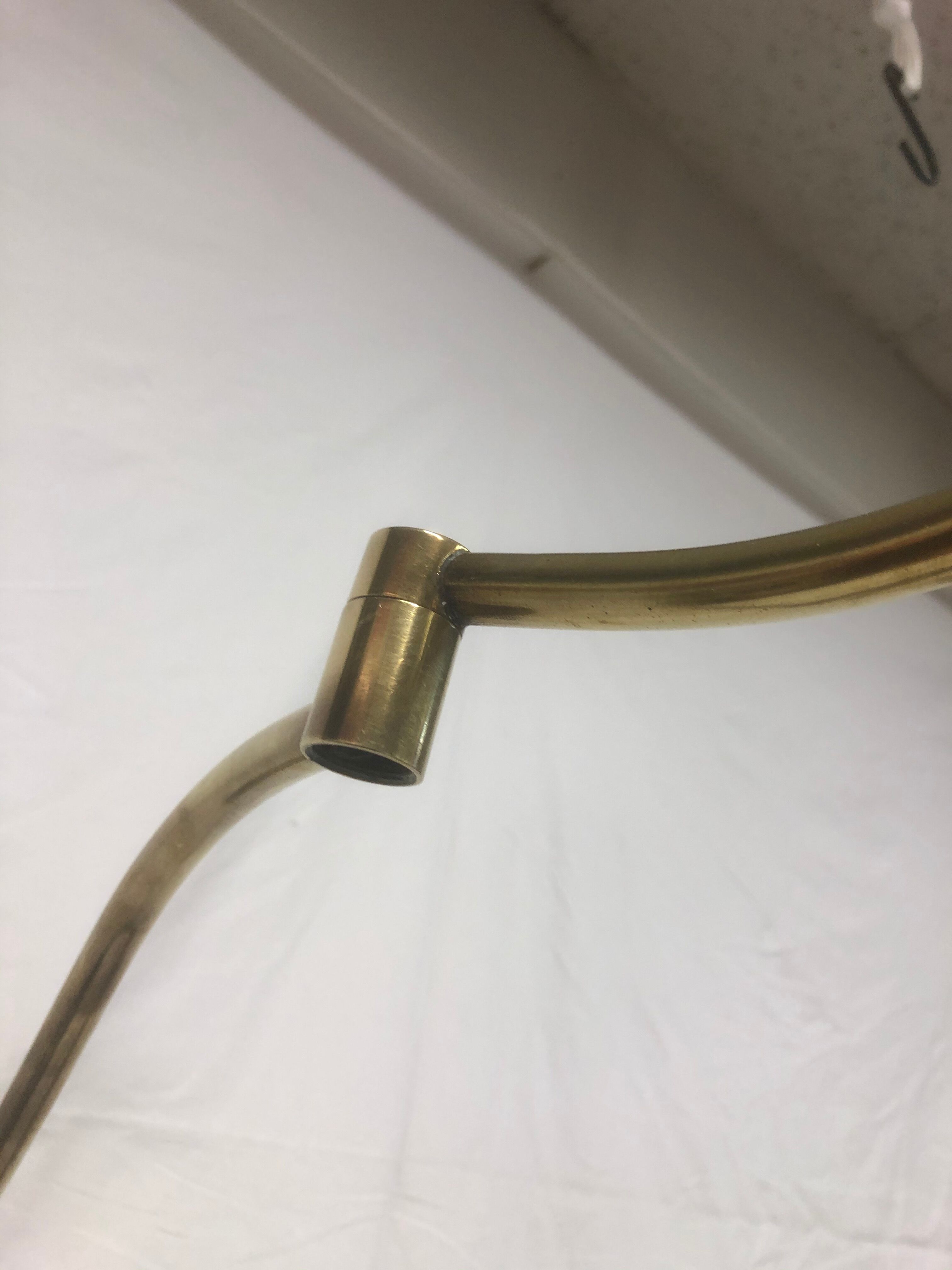 Articulated brass sconce 1950