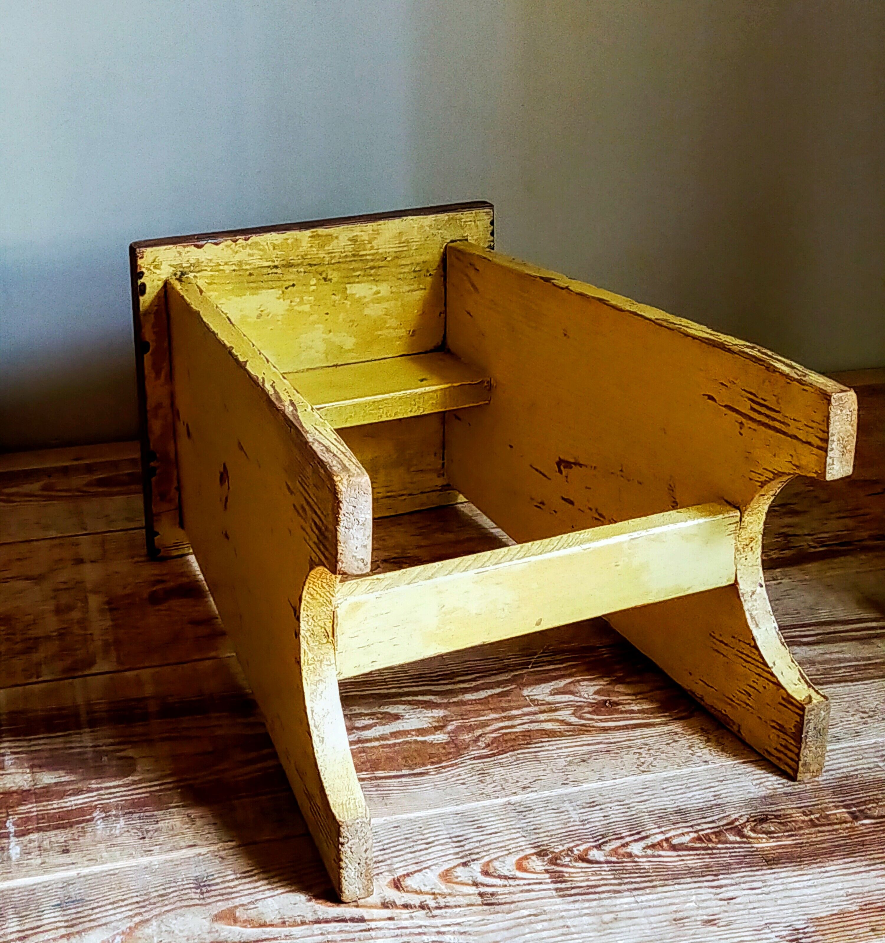 Art-populaire workshop stool in patinated wood