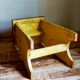 Art-populaire workshop stool in patinated wood