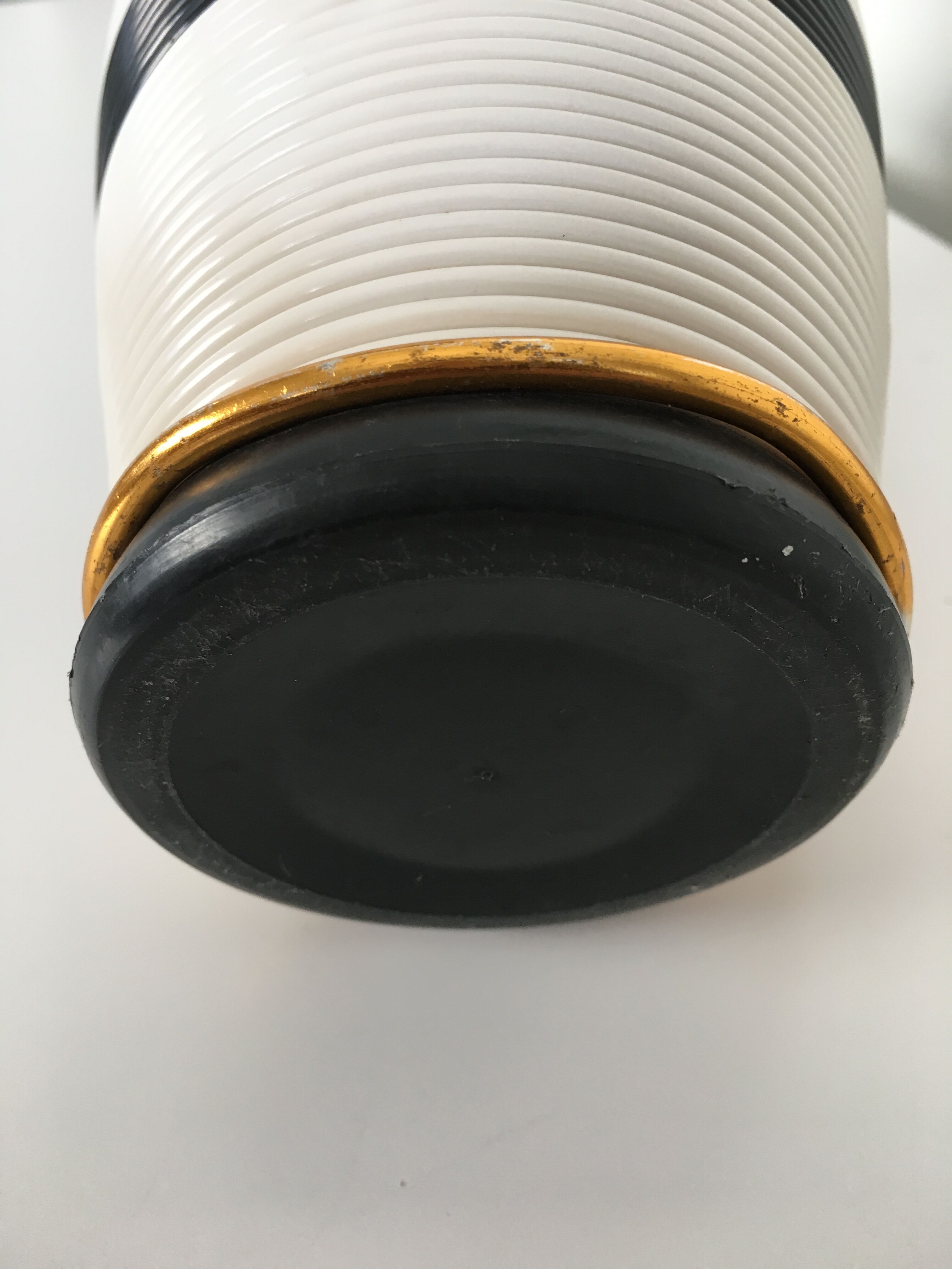 White and black scoubidou bottle