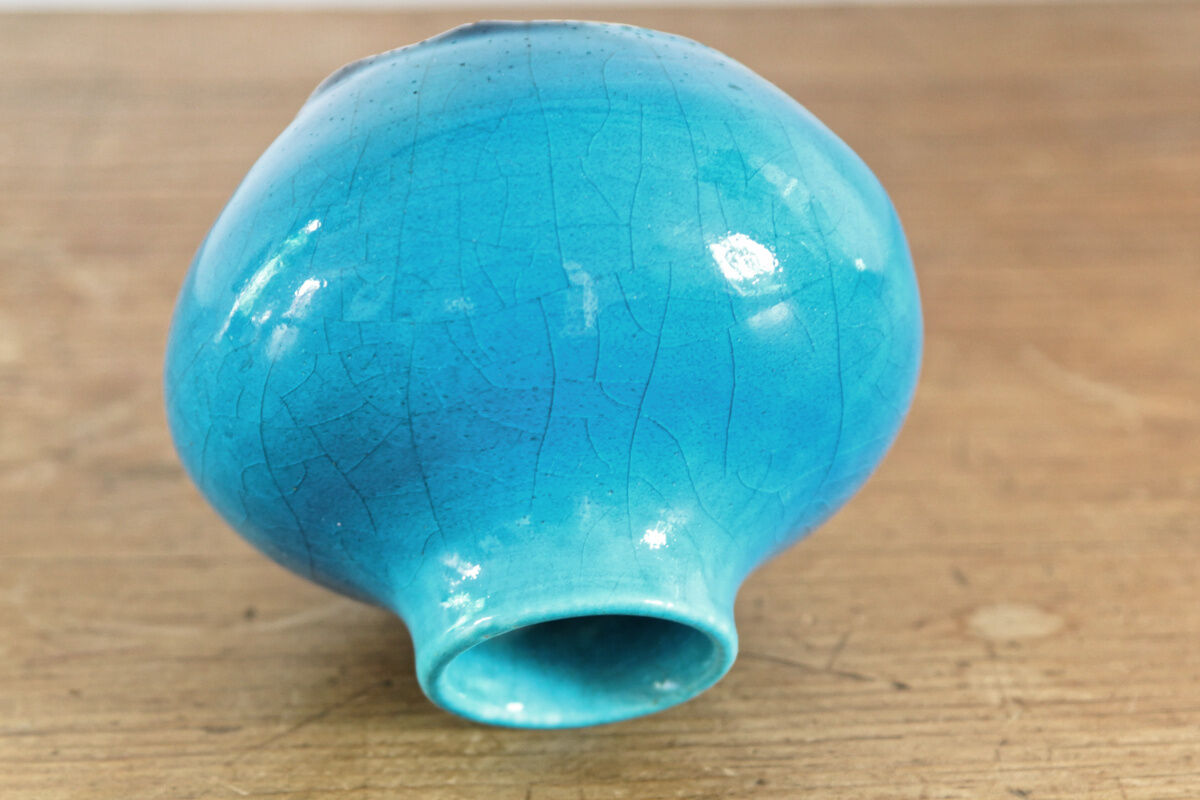 Glazed terracotta onion vase, signed