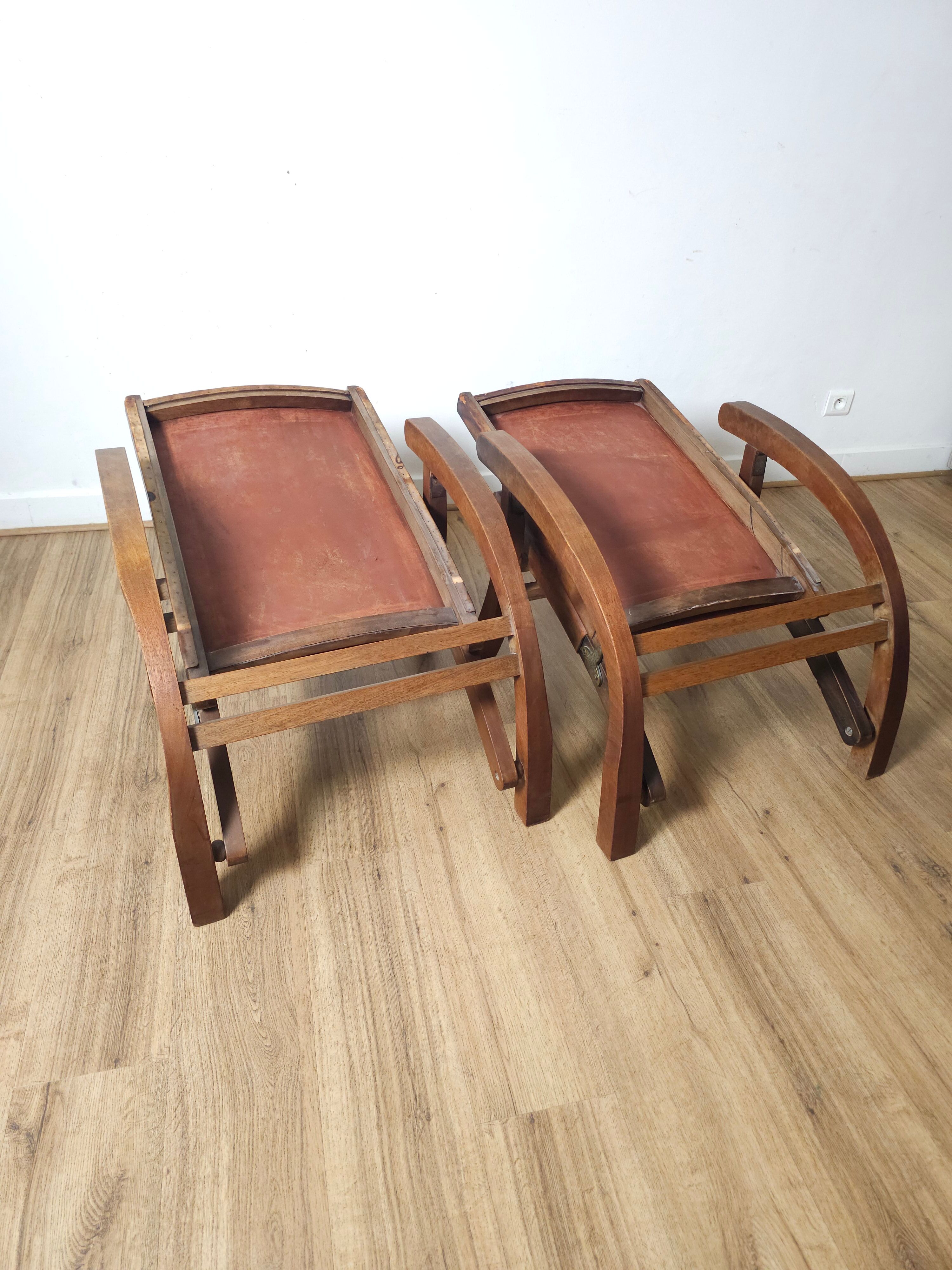 Leather and teak armchairs, by Angel Pazmino, circa 1960.