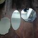 Three beveled mirrors