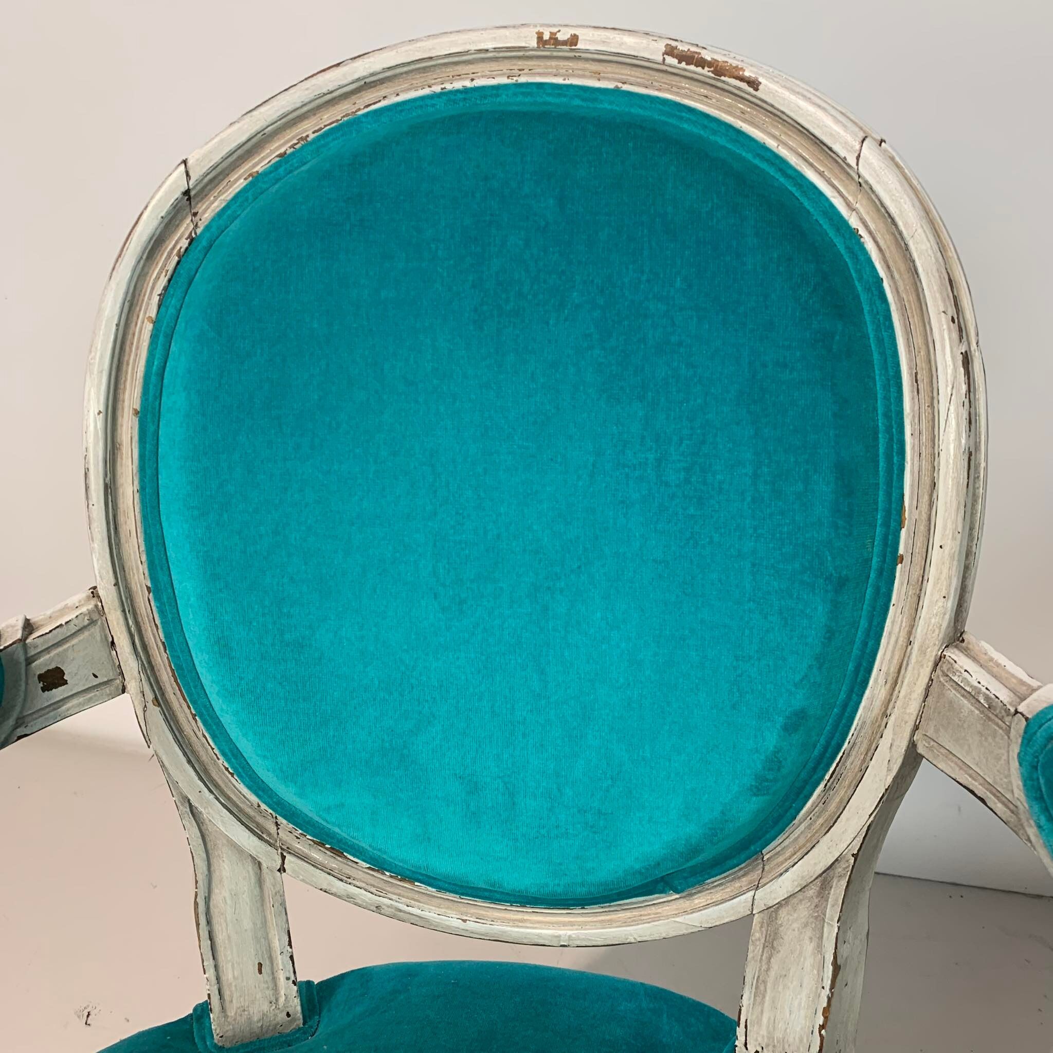 Pair of Louis XVI convertible armchairs