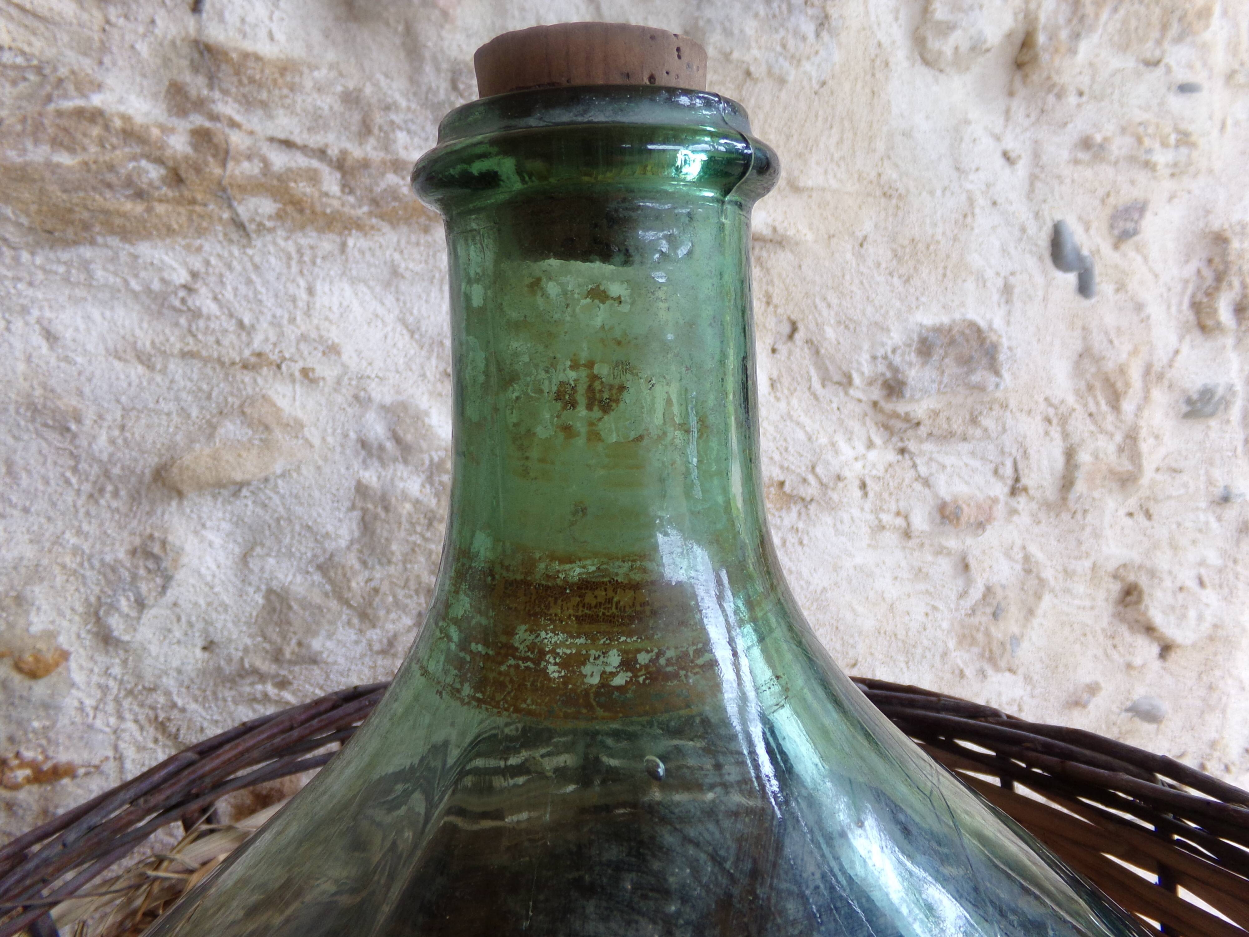 Dame-jeanne in her basket