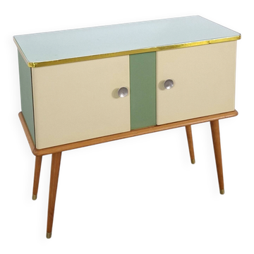 Vintage green DDR cabinet, model Libelle with glass top, slanted legs.