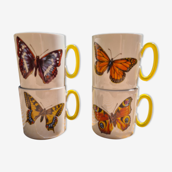 Four mugs decorated with Villeroy and Boch butterflies