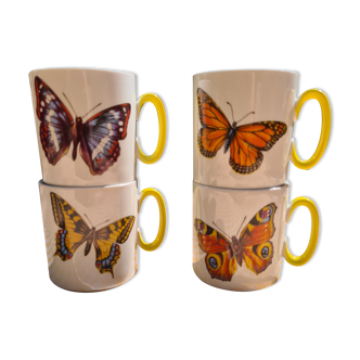 Four mugs decorated with Villeroy and Boch butterflies