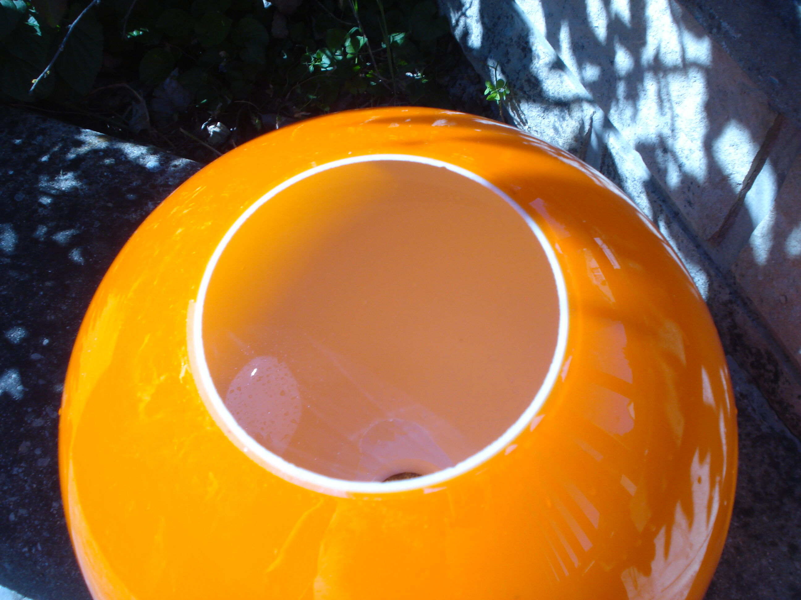 Orange glass globe, 1970