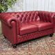Chesterfield 2-seater leather sofa, modern production from the 2000s.