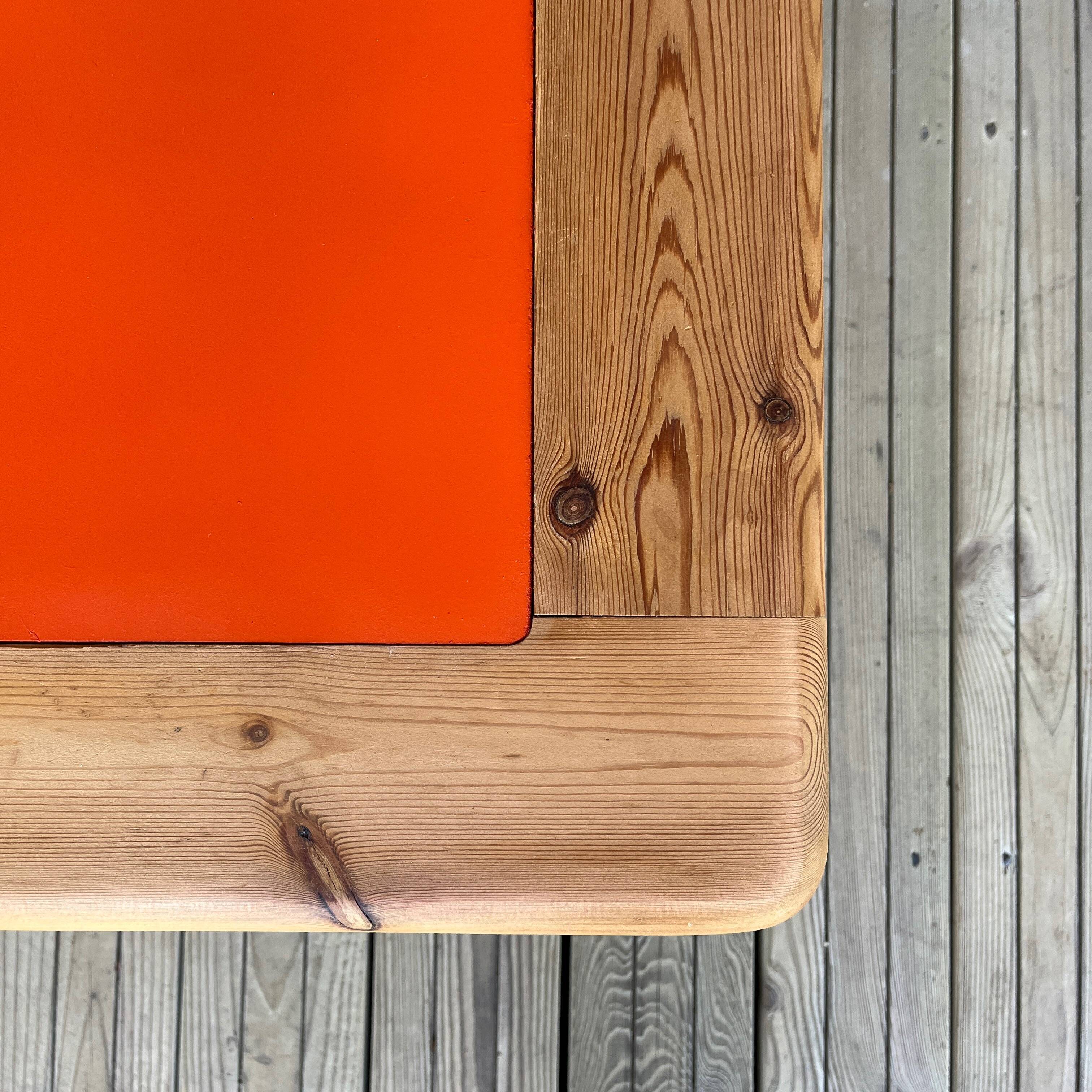 Modernist pine and orange lacquered coffee table, 1970s