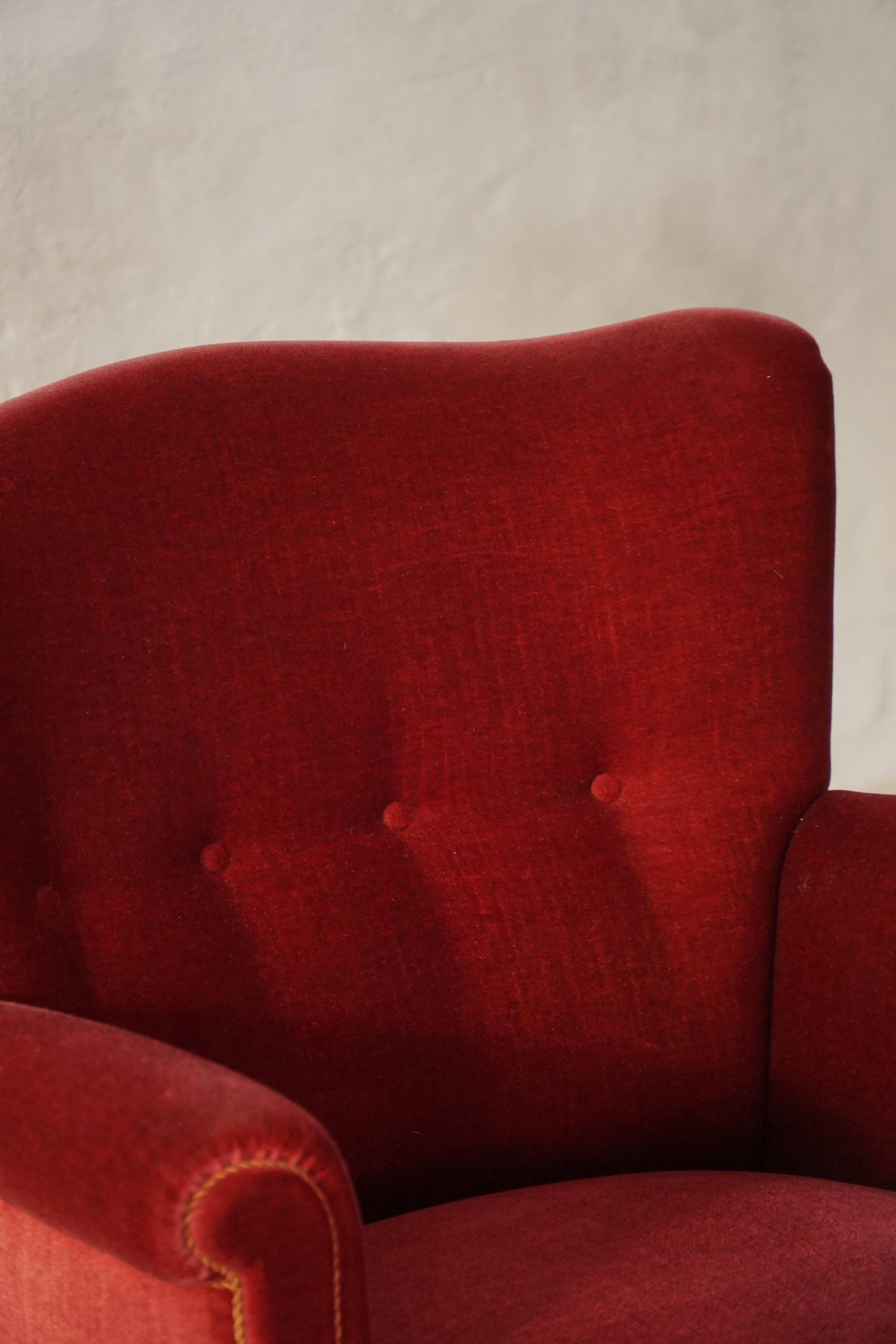 Pair of modern Danish lounge chairs, cherry red velvet, 1950s.