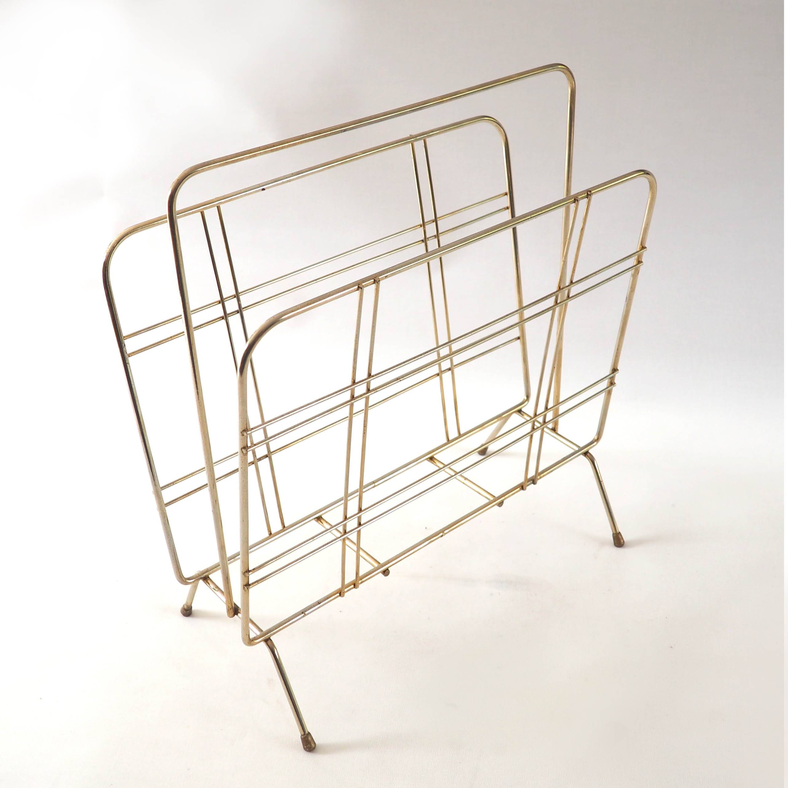 Gold metal magazine rack