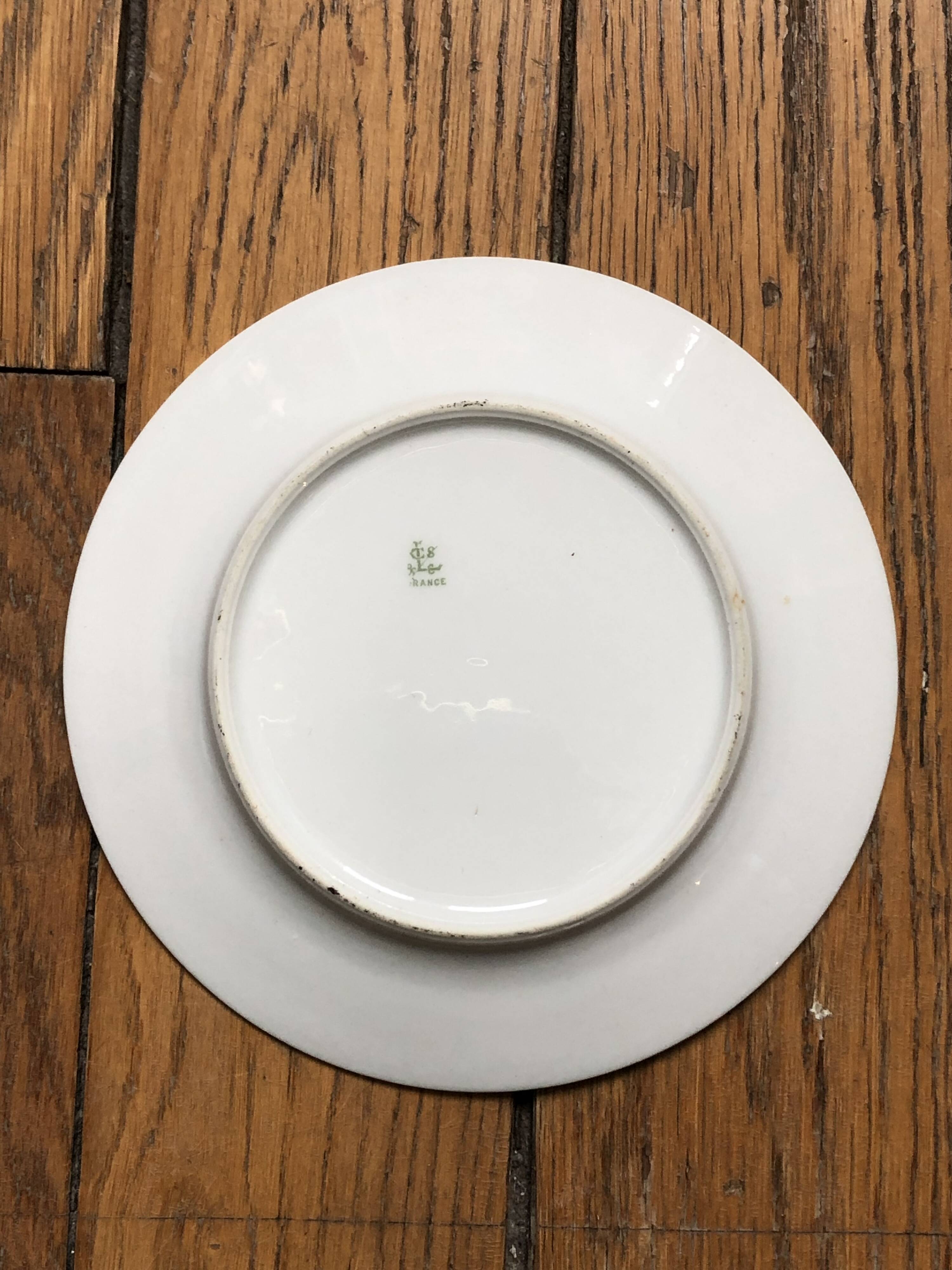 Set of 7 dessert plates in porcelain, butterfly pattern and wheat sheaves.