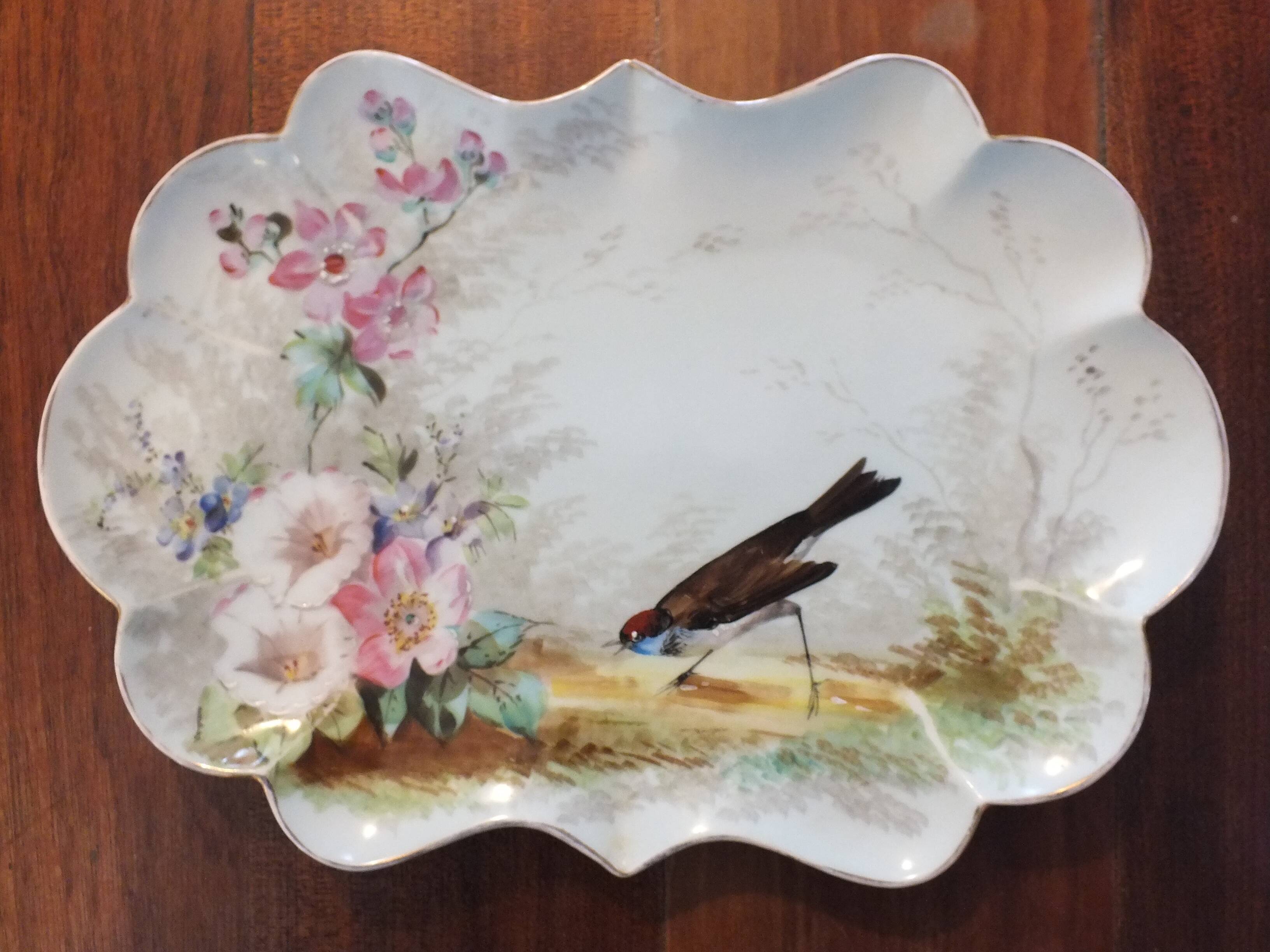 Pair of small porcelain dishes painted with birds and flowers 19th