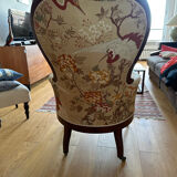 Violin-backed cabriolet armchair, in the Louis XV style.