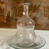 Carafe and flowered saucer