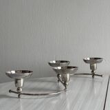 Shiny stainless steel candlestick holder