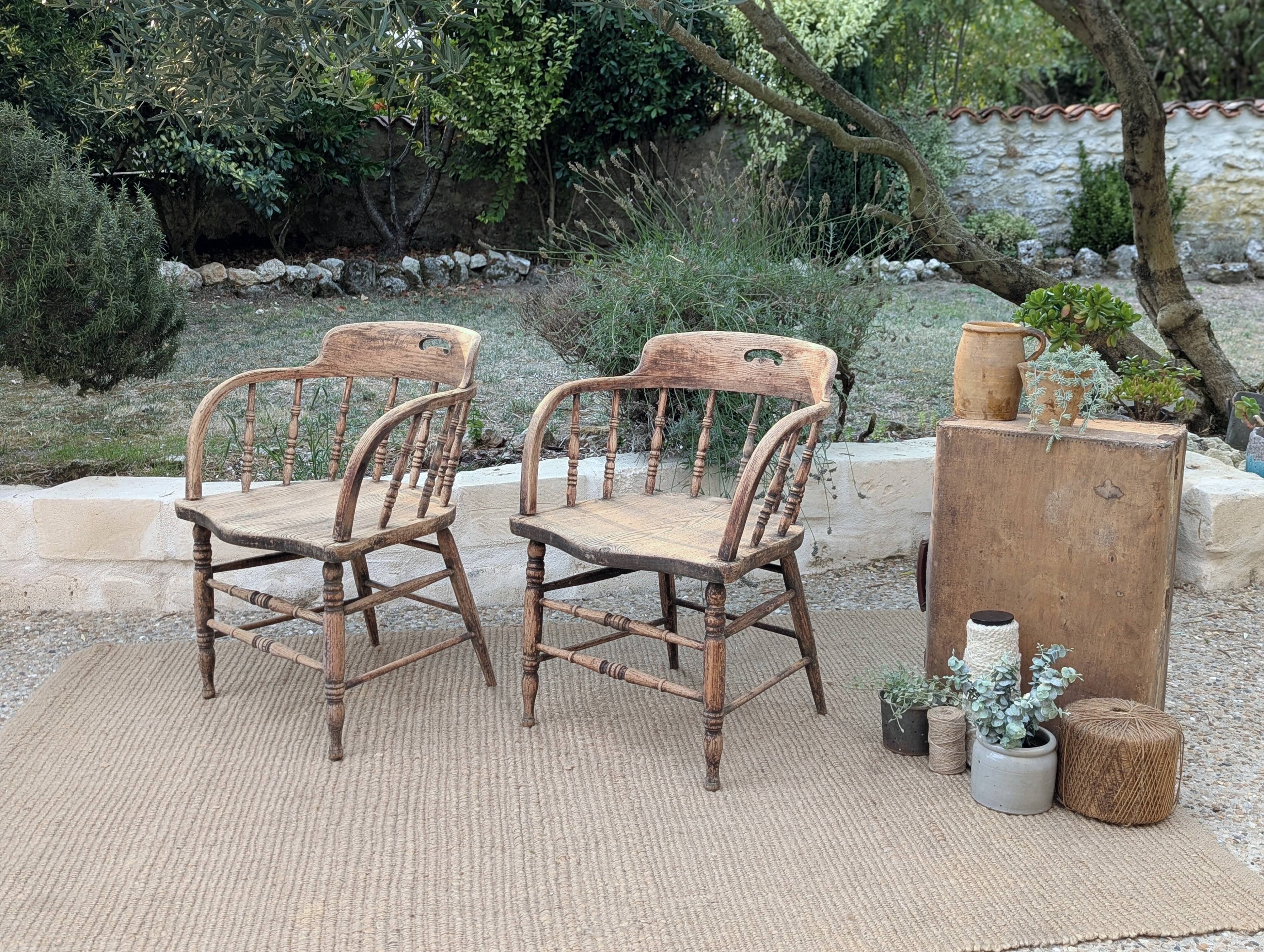 Pair of English captain's armchairs