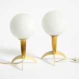 Two Mid-Century Modern rocket table lamps in brass and glass