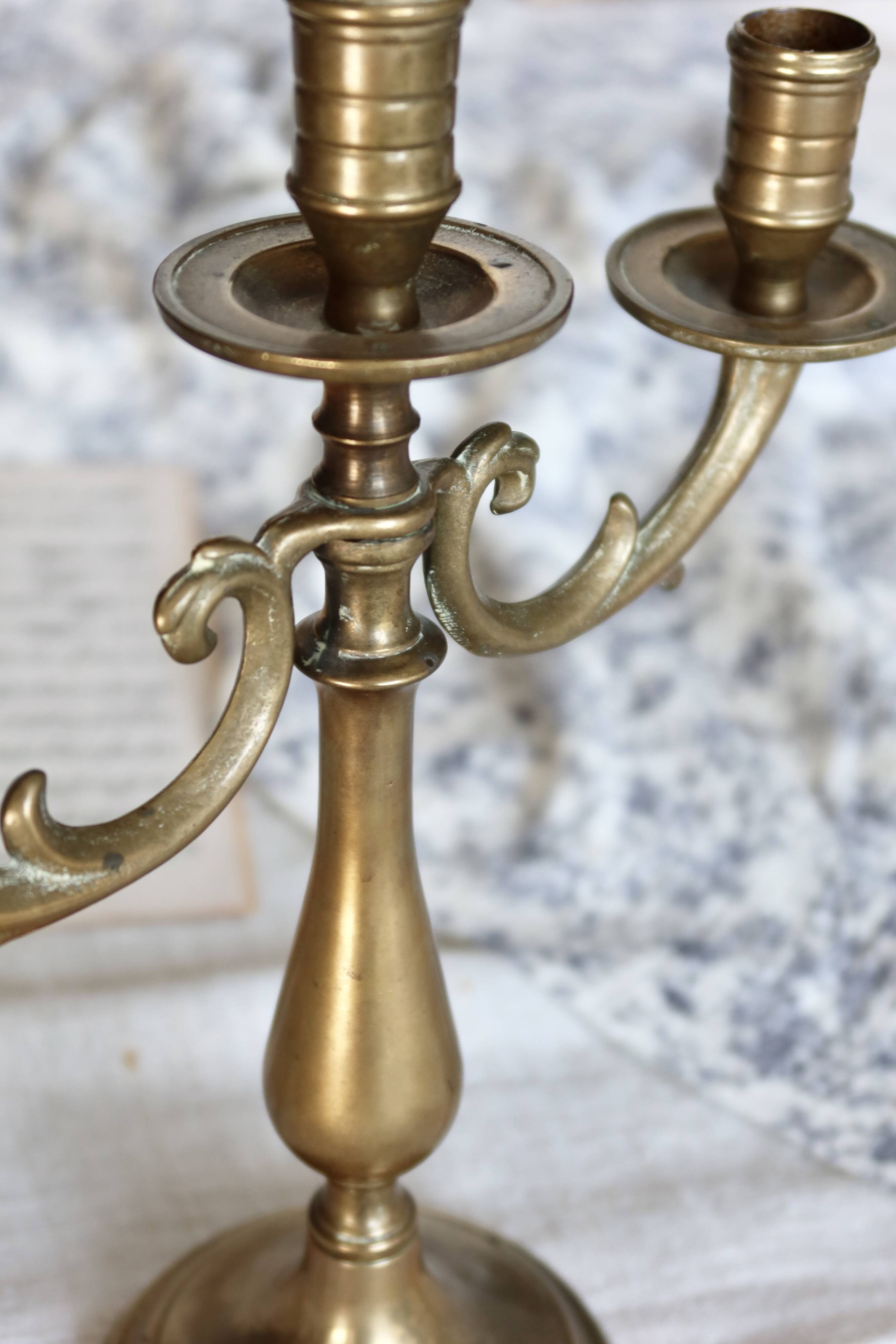 Antique 3-branch candelabra in patinated brass