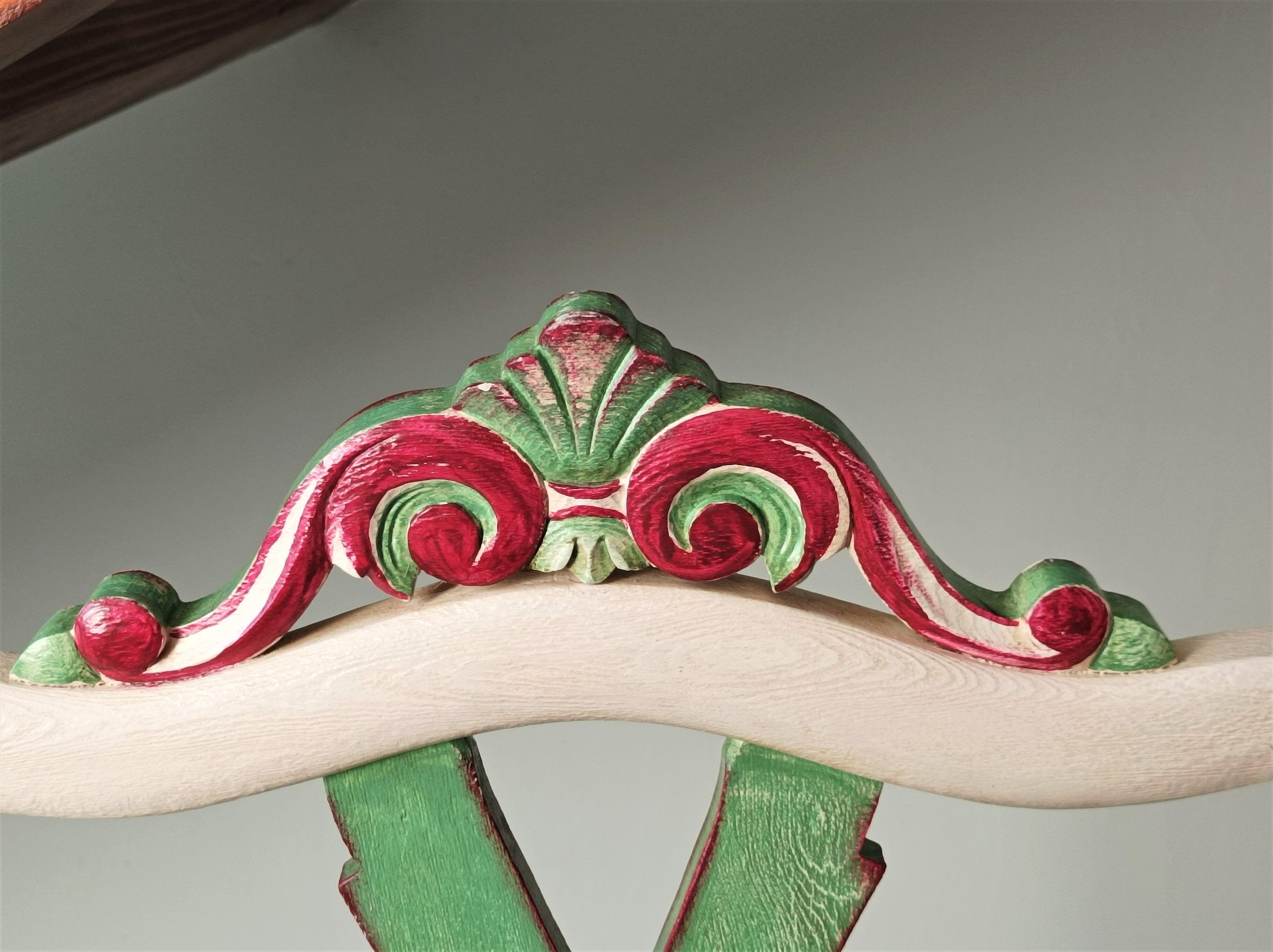 Chair with lyre backrest