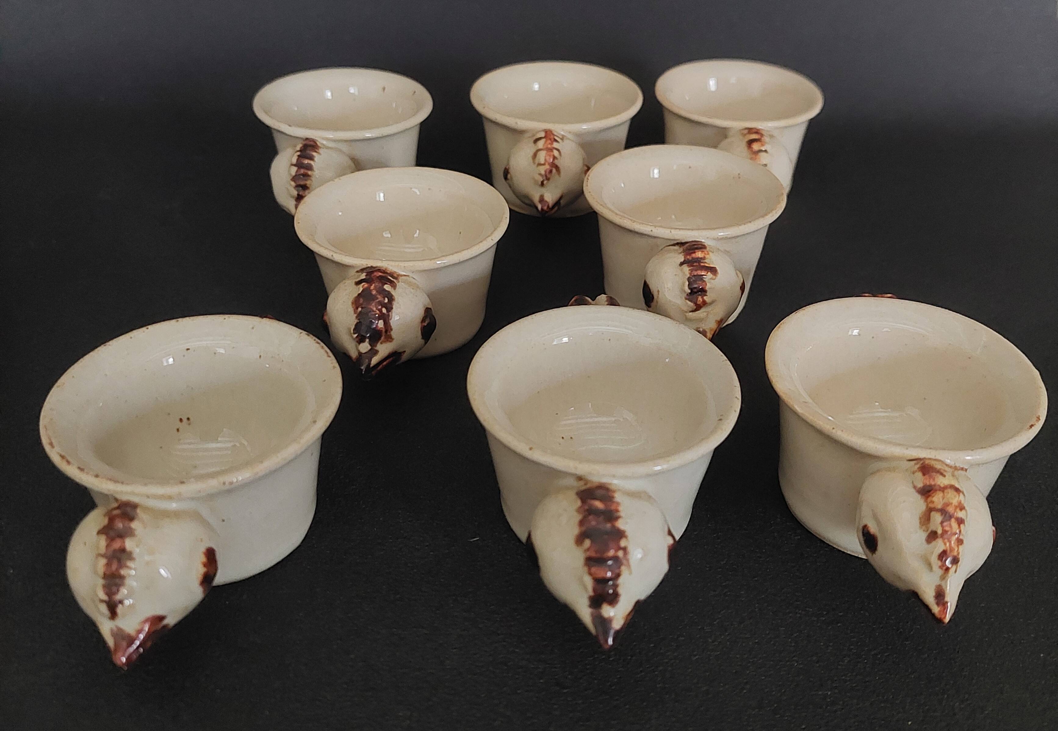 Egg cups with servant, series of eight stoneware signed arts ceram grand feu XX