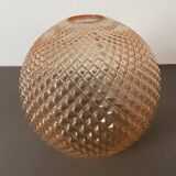 Spherical glass globe with pins. Salmon pink color