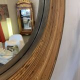 Large round mirror in rattan and brass