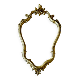 Old baroque style wall mirror with golden moldings