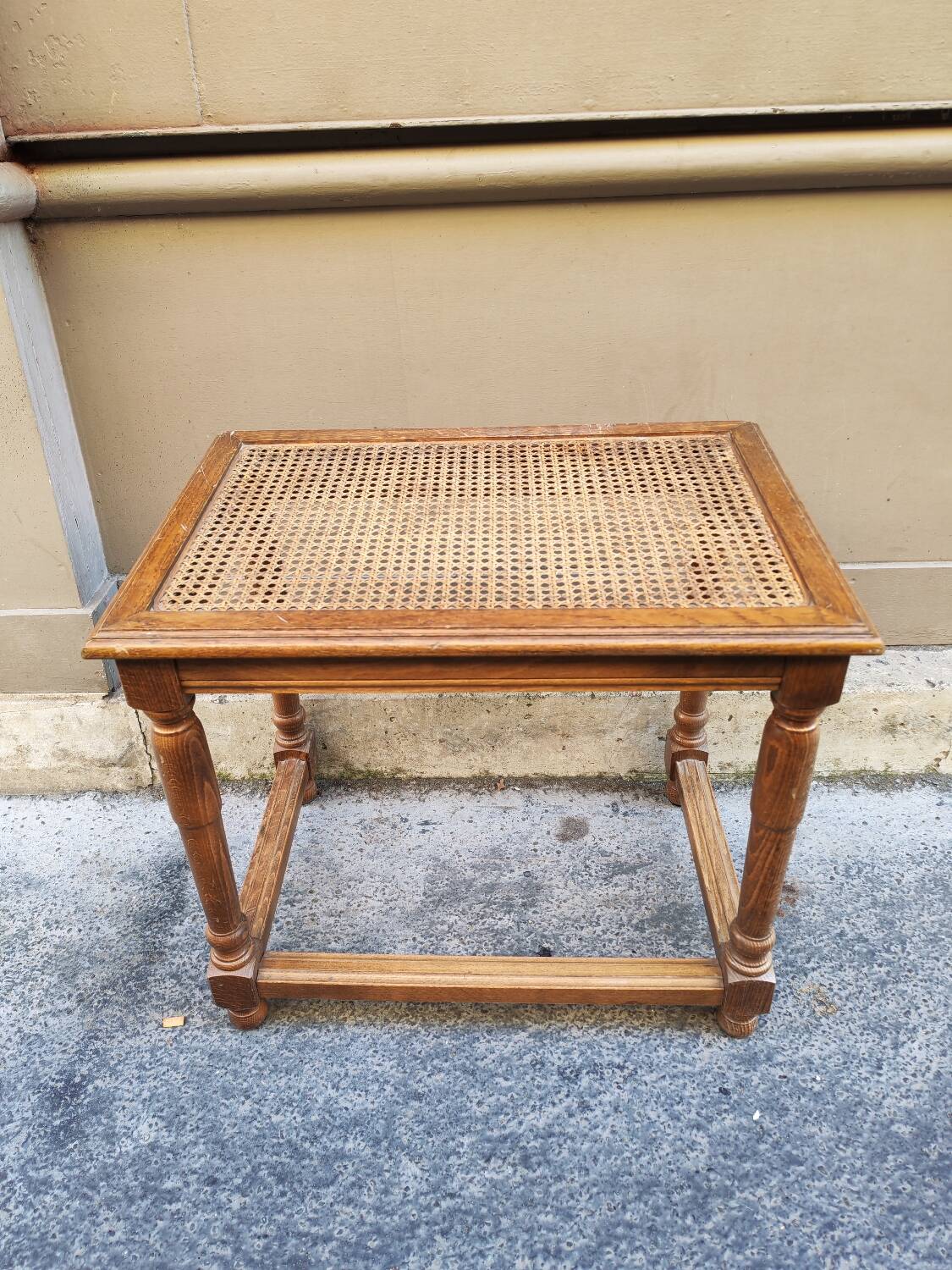 Wooden bench with caning
