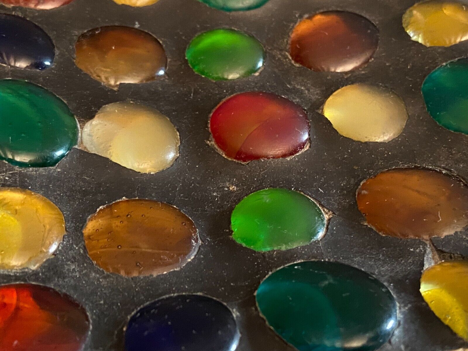 Square section cut glass and metal decorated with multicolored glass cabochons