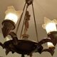 Large Art Deco sculptural chandelier in bronze and glass, 1930s