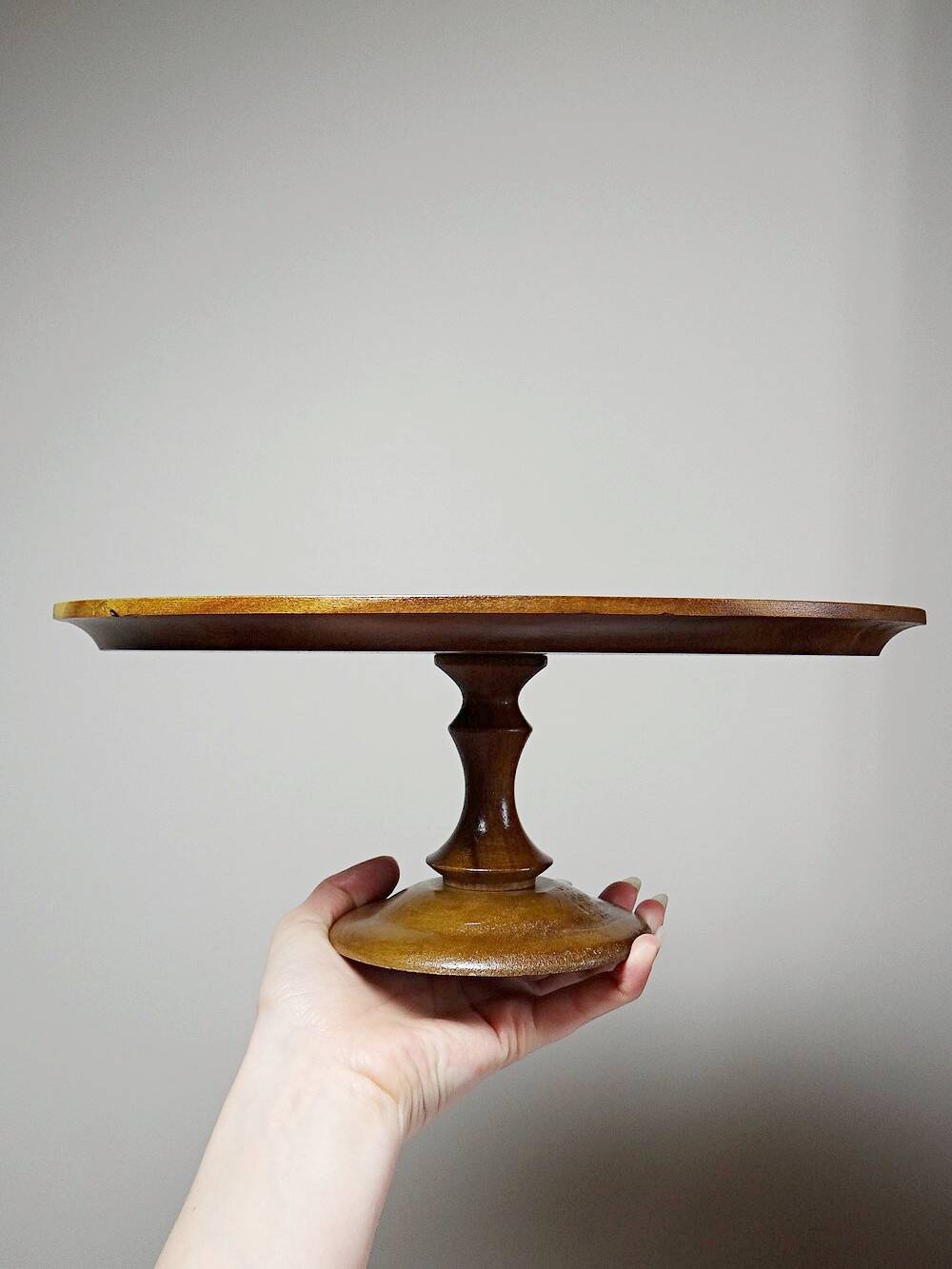 Vintage turned oval wooden display stand
