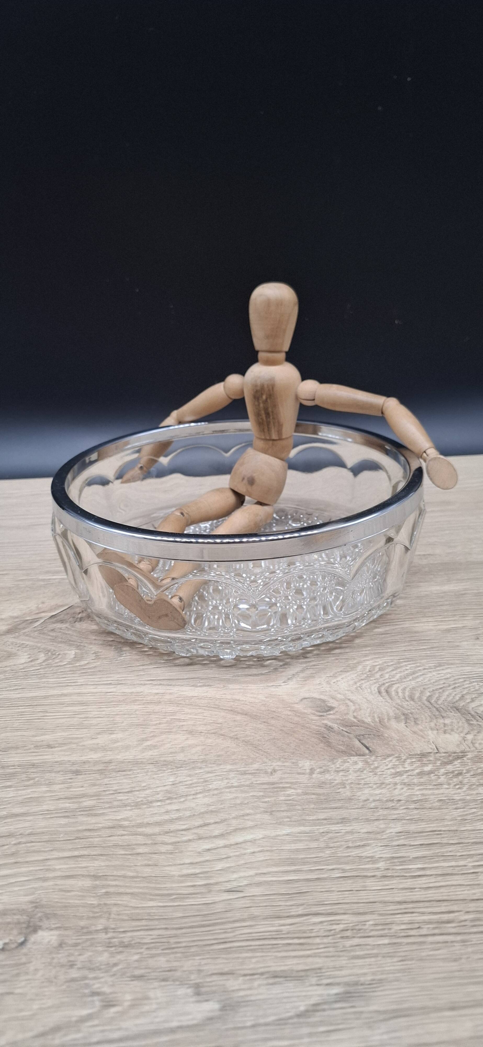 Chiseled glass salad bowl with metal rim